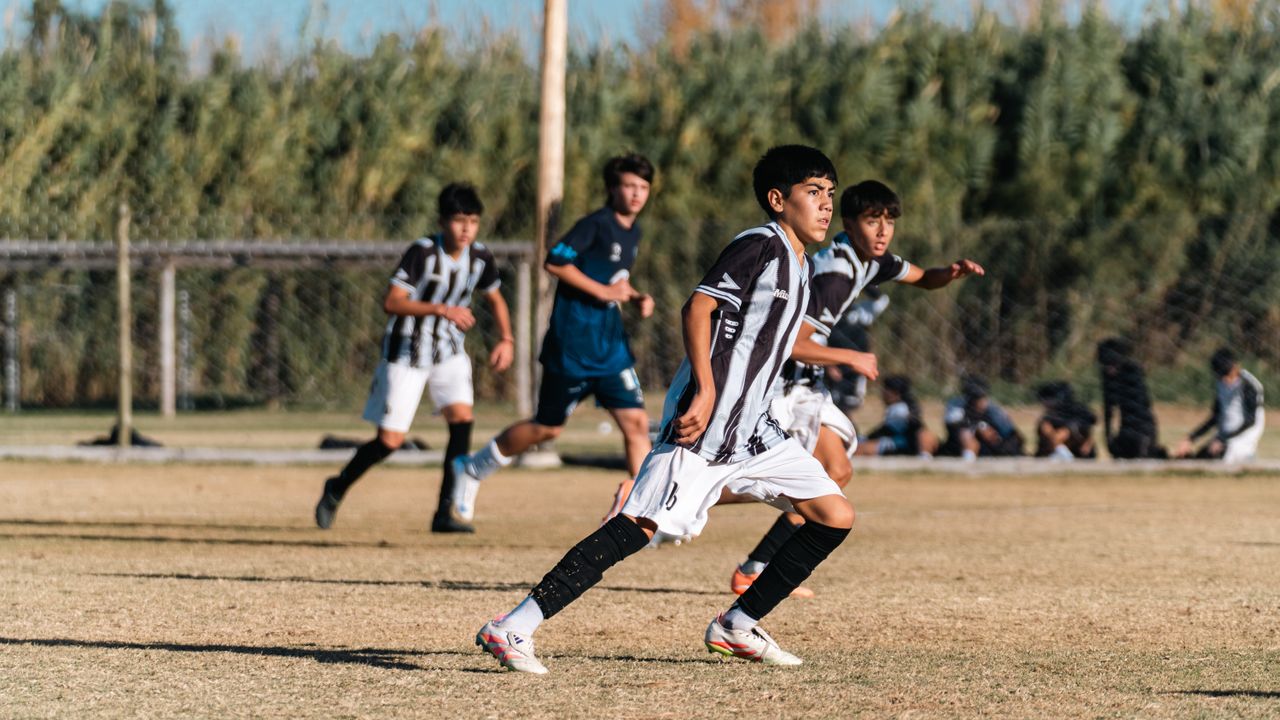 Energetic youth soccer game capturing young players in action on the field.